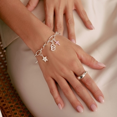 Thomas Sabo Charm Club Connect összefonódott szívek charm medál (CC1201-051-14)