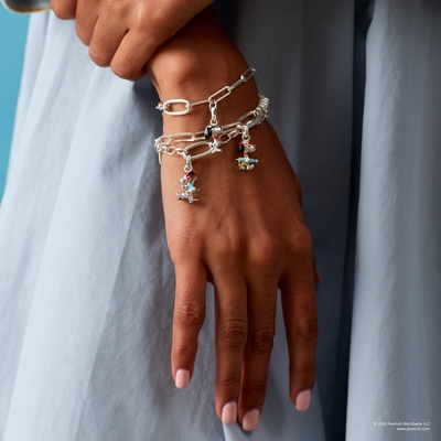 Thomas Sabo Charm Club Connect Peanuts™ Snoopy gördeszkán charm medál (CC1346-664-7)