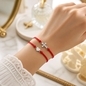 Ezüst kereszt és szív karkötő 19 cm (07RED217-01)